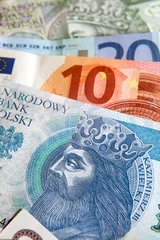 Fototapeten Polish money Zloty's bank notes with Euro's © Richard