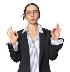 Confident young Caucasian businesswoman on studio background relaxes after hard working day, she is...