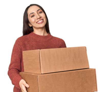 Young Caucasian woman holding moving boxes