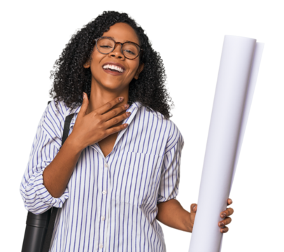 Young African American architect with blueprint laughs out loudly keeping hand on chest.