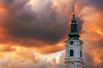 Dormition church tower in Novi Sad, Serbia. Beautiful orthodox religious building in summer sunset.