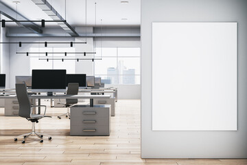 Modern office interior with desks, chairs, and computers, wooden floor, city view through windows, concept of a corporate workplace. 3D Rendering