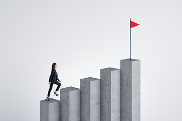 Businesswoman climbing concrete business chart top with flag on white background. Success,...