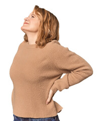 Blonde middle-aged Caucasian woman in studio suffering a back pain.