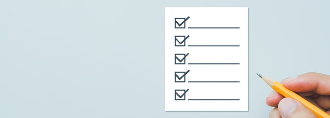 Businessman checking mark on the check boxes, Checklist concept, copy space