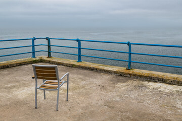 Fototapeta na wymiar A Seat by the Sea.