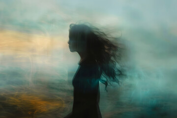 Female silhouette on blur blue background. Abstrackt portreit of women near the foggy ocean. Impressionist style. Abstract landscape art for poster, music album, book cover, poetry, wallpaper