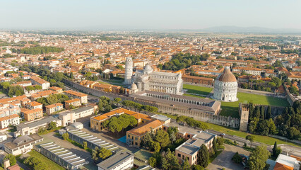 Pisa, Italy. The famous Leaning Tower and Pisa Cathedral in Piazza dei Miracoli. Summer. Evening hours, Aerial View