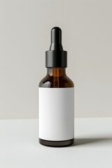 Amber dropper bottle with blank label on white  background