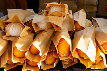 Bread Is Sold In Brown Paper Bags.