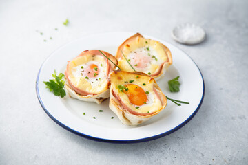 Baked eggs with bacon and chives