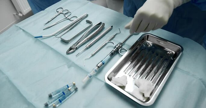 Sterile instruments at the dental clinic. tools for tooth treatment. Sterile instruments in a modern dental clinic for tooth extraction. Health care concept.