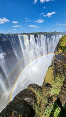 The Victoria Falls is the waterfall located on the Zambezi River between and Zimbabwe.