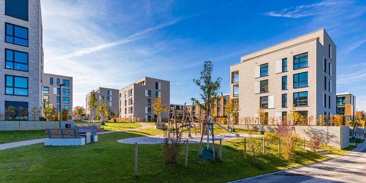 Germany, Baden-Wurttemberg, Leonberg, Playground between modern apartment buildings in new development area