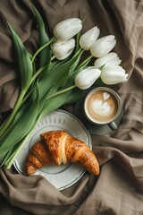 Cappuccino and croissant breakfast with white tulips on a table. Generated AI. - 766913239