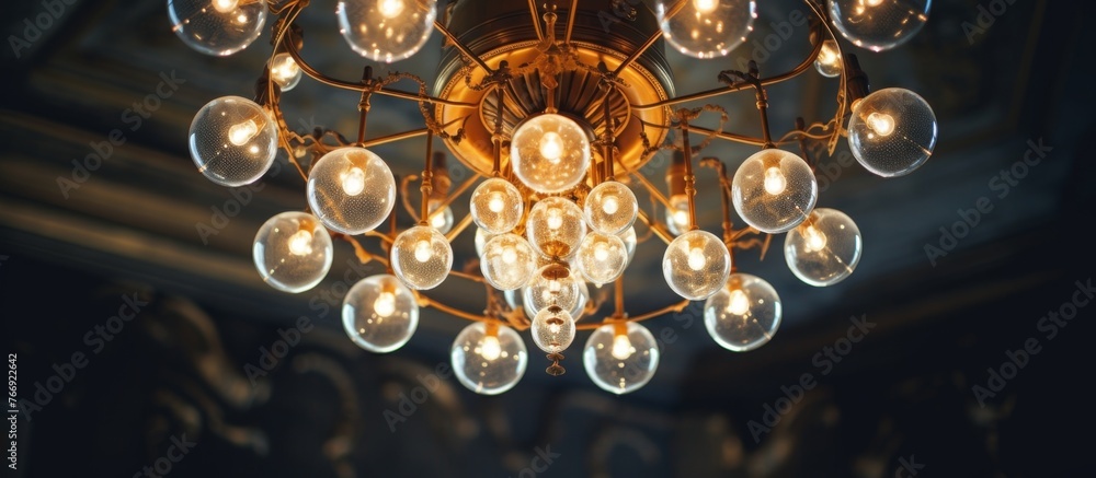 Poster a golden chandelier adorned with intricate patterns and symmetrical designs hangs from the ceiling, 
