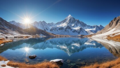 The first rays of sunlight spread over a frosty mountain landscape, reflecting in the lake below. The sun's debut enhances the striking contrast between the snowy peaks and the blue sky. AI generation