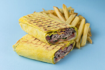 shawarma  with beef, cheese and vegetables and french fries