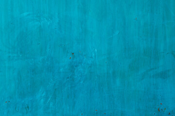 rough turquoise matte paint on flat sheet metal surface - full-frame background and texture.