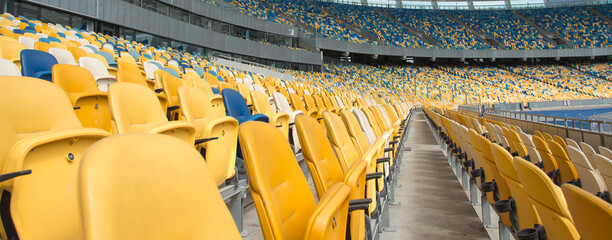 Rows empty plastic chairs seats in a sports stadium. Sports border.