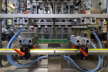 Liquid detergent filling line in a factory.