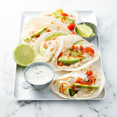 Homemade chicken taco with avocado