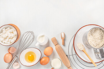 Bakery background cooking ingredients egg, flour, sugar, butter, Long banner format. top view. copy space for text