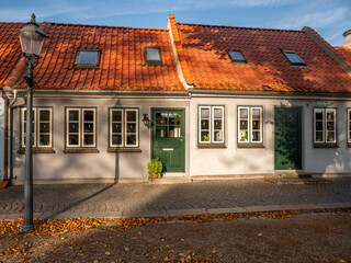 Fototapeta na wymiar Charming old houses on Torvet Square in old town of Bogense, Funen, Denmark