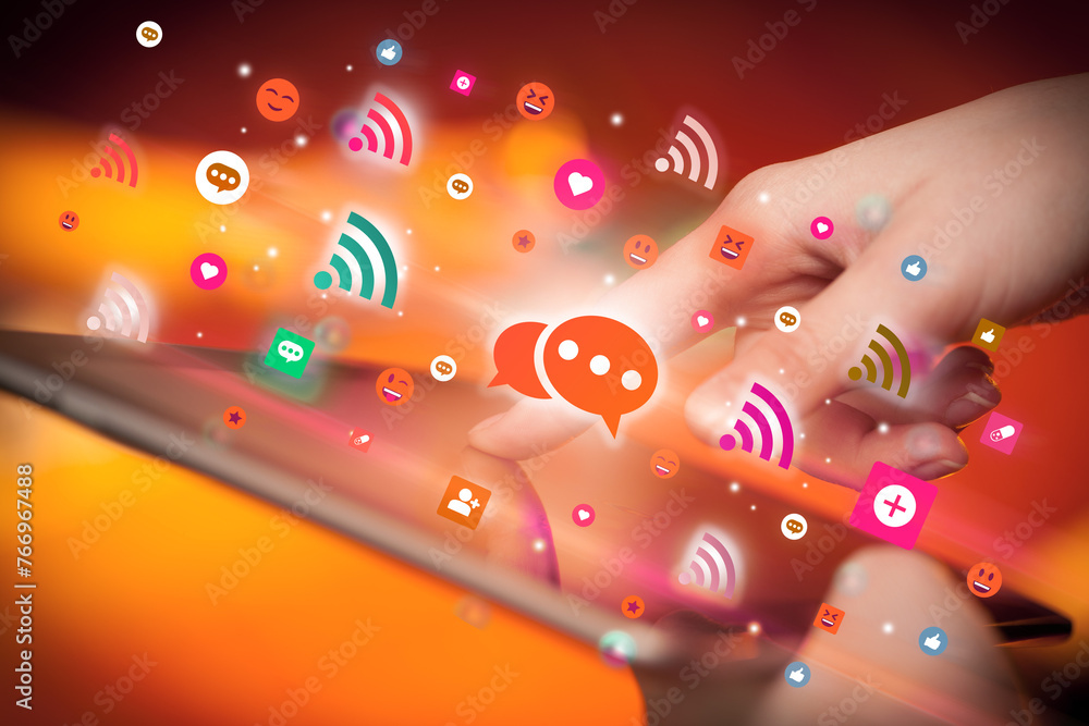 Aufkleber close-up of a hand using tablet with social media icons