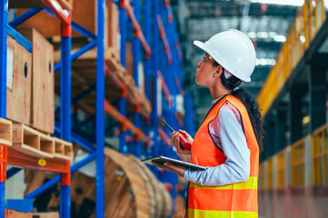 the worker is depicted amidst the organized chaos of a bustling warehouse, engaged in tasks such as inventory management, order fulfillment, or logistical operations.