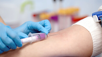 Blood donation close-up. Clinical studies, drugs, tests. Covid-19 pandemic and medicine concept.