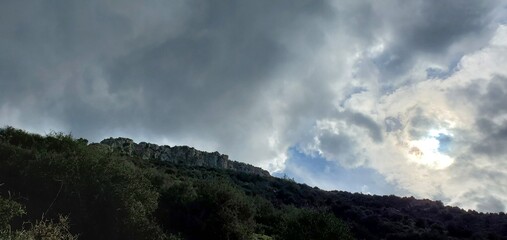 Fototapeta premium Storm clouds over the mountain top in Cyprus