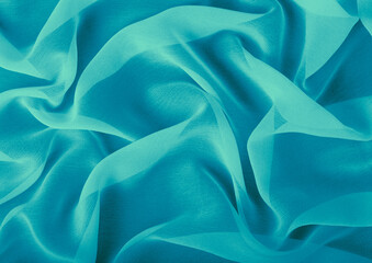 Obraz premium Green cloth pattern close view, textile material background