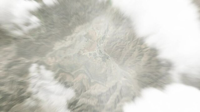 Earth zoom in from space to Ar Rustaq, Oman. Followed by zoom out through clouds and atmosphere into space. Satellite view. Travel intro. Images from NASA