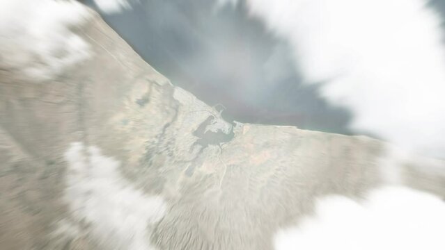 Earth zoom in from space to Sur, Oman. Followed by zoom out through clouds and atmosphere into space. Satellite view. Travel intro. Images from NASA