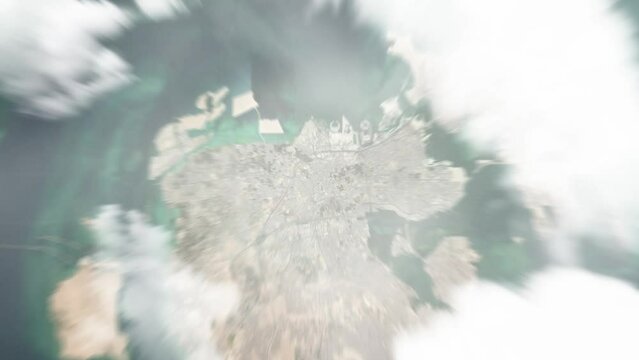 Earth zoom in from space to Jidd Hafs, Bahrain. Followed by zoom out through clouds and atmosphere into space. Satellite view. Travel intro. Images from NASA