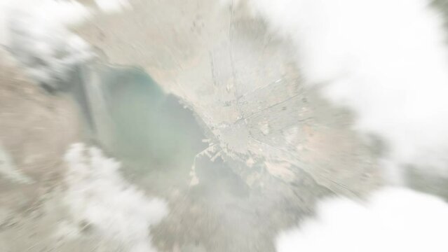 Earth zoom in from space to An Najaf, Iraq. Followed by zoom out through clouds and atmosphere into space. Satellite view. Travel intro. Images from NASA