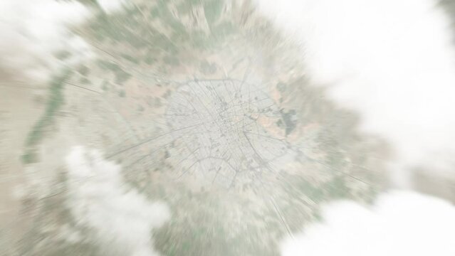 Earth zoom in from space to Kerman, Iran. Followed by zoom out through clouds and atmosphere into space. Satellite view. Travel intro. Images from NASA