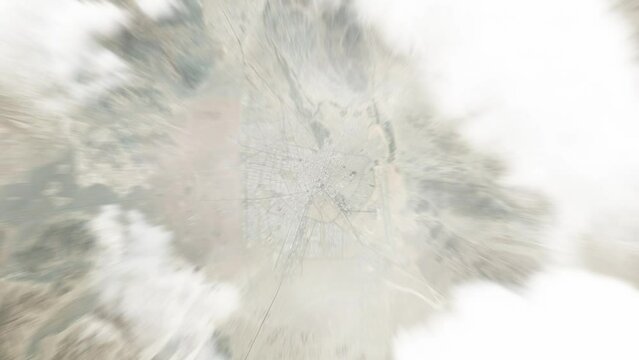 Earth zoom in from space to Zahedan, Iran. Followed by zoom out through clouds and atmosphere into space. Satellite view. Travel intro. Images from NASA