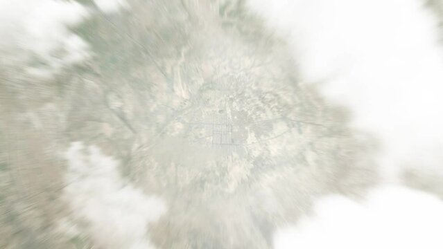 Earth zoom in from space to Zaranj, Afghanistan. Followed by zoom out through clouds and atmosphere into space. Satellite view. Travel intro. Images from NASA