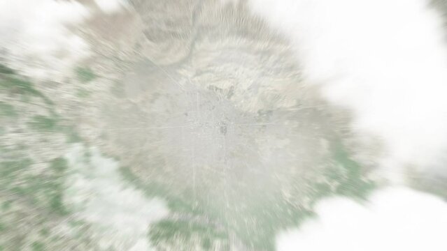 Earth zoom in from space to Herat, Afghanistan. Followed by zoom out through clouds and atmosphere into space. Satellite view. Travel intro. Images from NASA