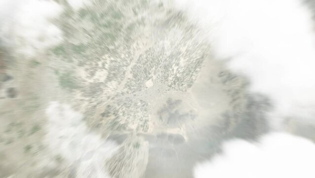 Earth zoom in from space to Farah, Afghanistan. Followed by zoom out through clouds and atmosphere into space. Satellite view. Travel intro. Images from NASA