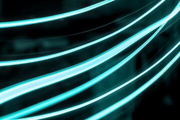 Defocused ultraviolet navy blue color light lines motion on dark black futuristic abstract...
