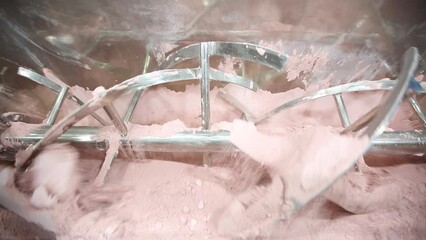 powder medicine mixing and blending process close up. protein powder chemical pharma ingredient in a large equipment production line in a pharma manufacturing plant factory	