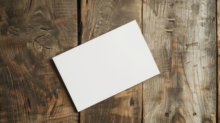 a mockup of a blank white postcard on a wooden table	
 - obrazy, fototapety, plakaty