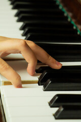 Teenager hand on piano keys, Concept music practice, training, developing fluent hand movement