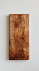 A rectangular MDF wooden plate vertically mounted on a white wall - obrazy, fototapety, plakaty