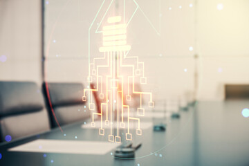 Virtual creative light bulb with chip hologram on a modern boardroom background, artificial Intelligence and neural networks concept. Multiexposure - obrazy, fototapety, plakaty