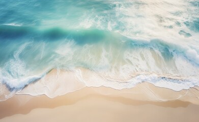 Aerial View Captures Serene Beachfront With Crashing Turquoise Waves at Midday