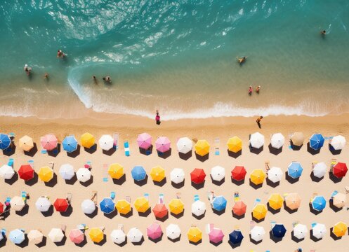 Aerial View of Beach With Umbrellas and People